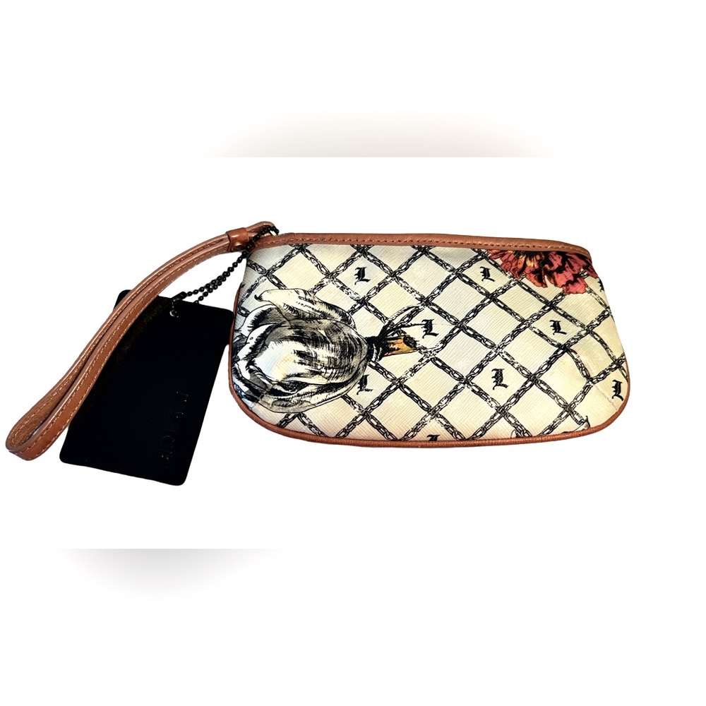 L.A.M.B. Preowned Gwen Stefani Wristlet Wallet
Marigold Floral Graphic  (P069) - Picture 2 of 9